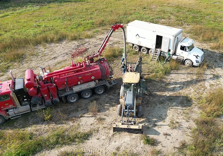 Trucks and other heavy equipment on worksite