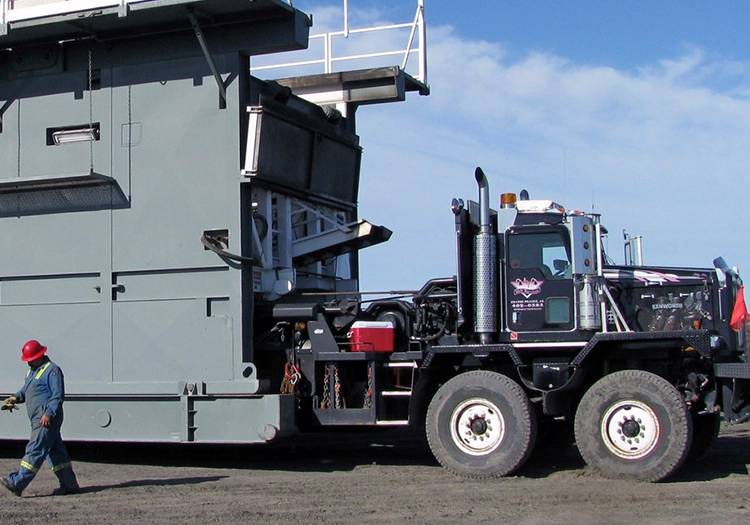 Large truck hauling heavy object