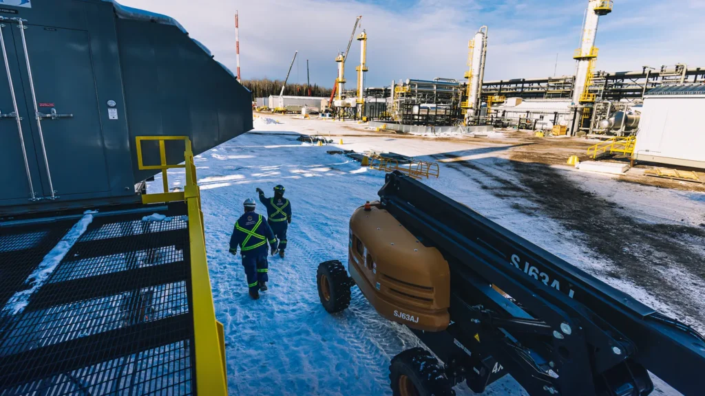 Workers walking through work site